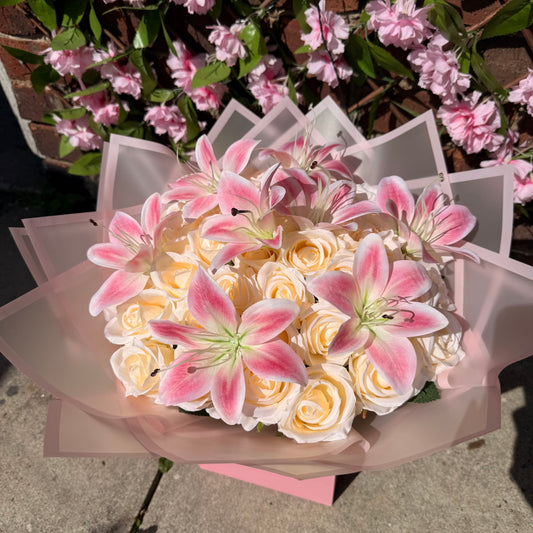 Champagne forever rose and pink lily bouquet with luxury wrapping