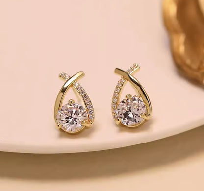 Gold Teardrop Twist Design Womens Stud Earrings